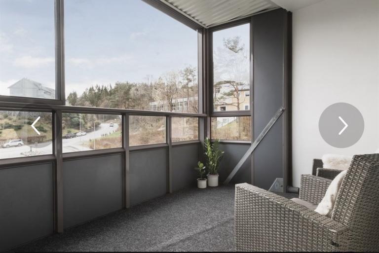 Sørvendt innglasset balkong